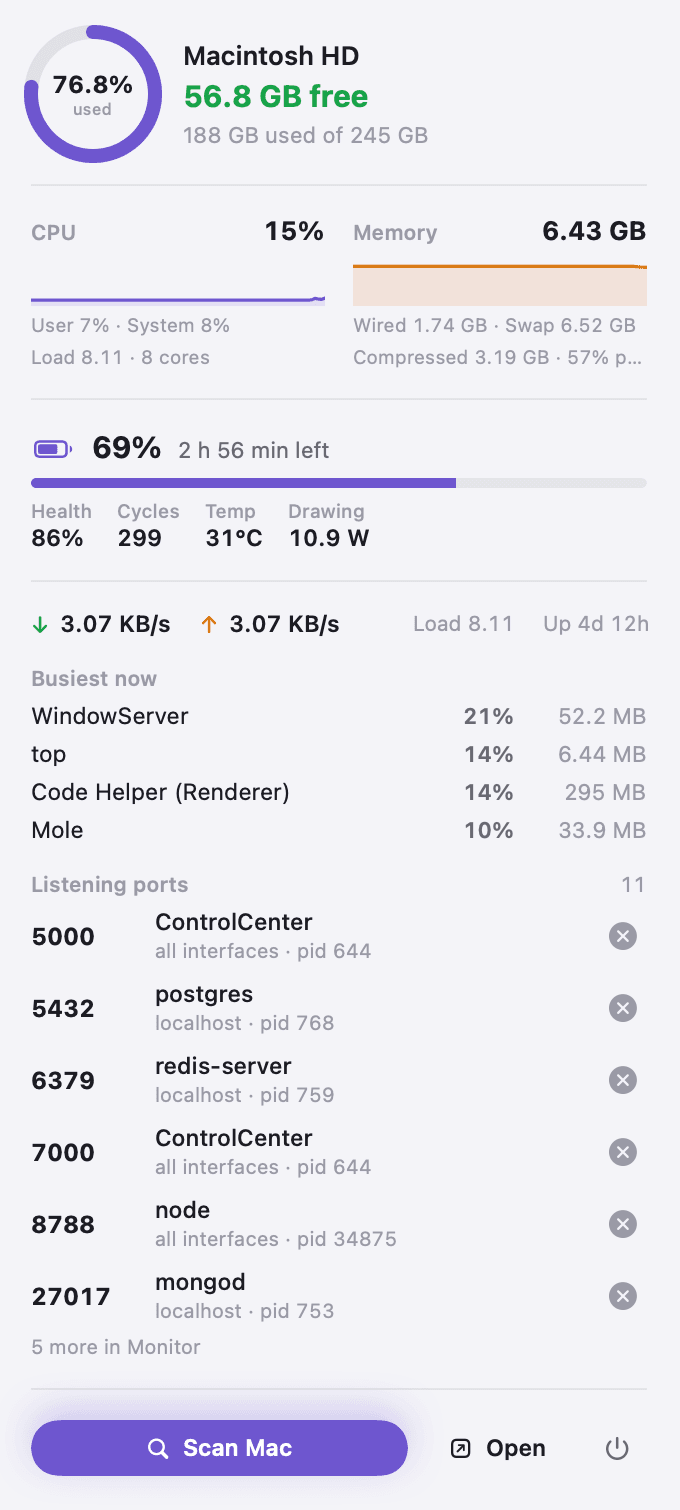 DiskBuddy's menu bar popover with drive, CPU, memory, battery and ports.